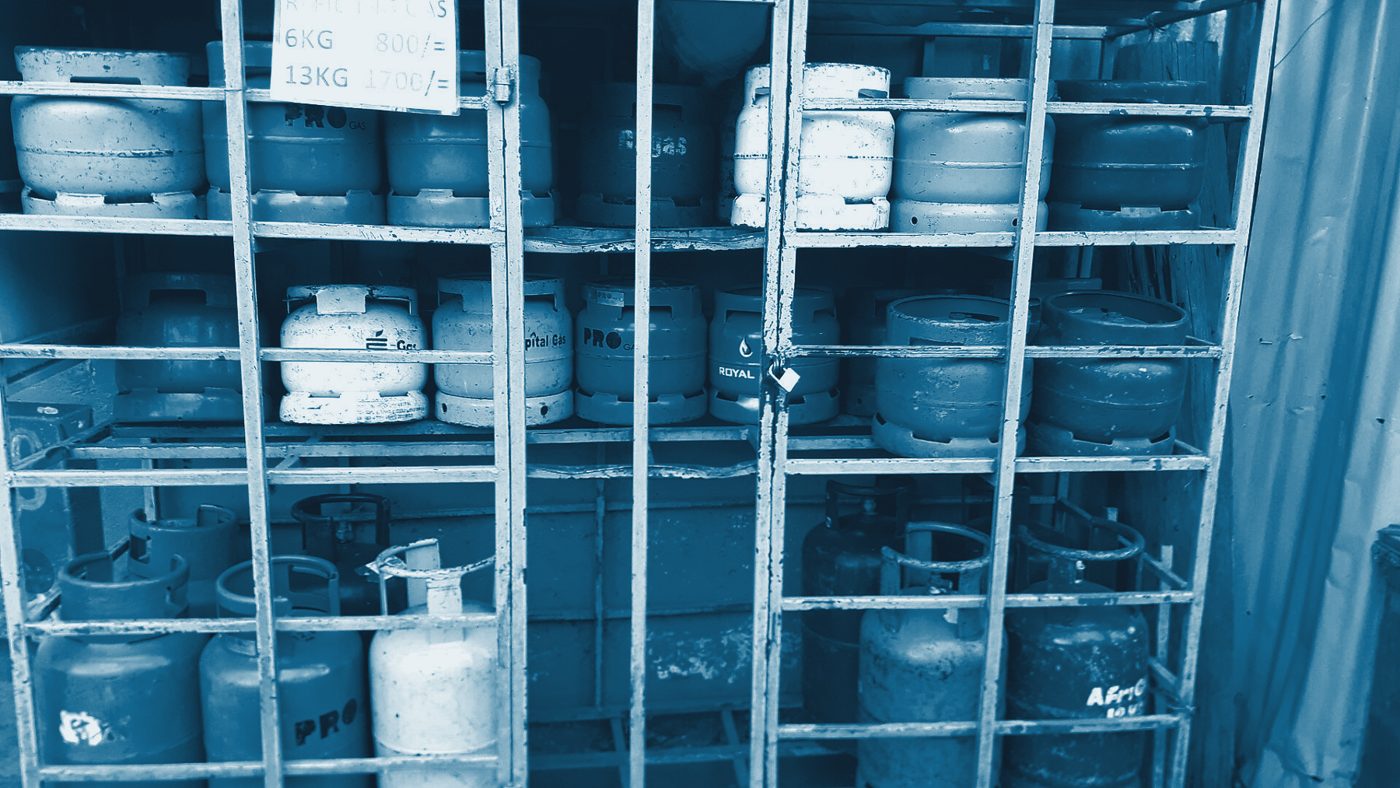 LPG cylinders stacked in a caged storage rack