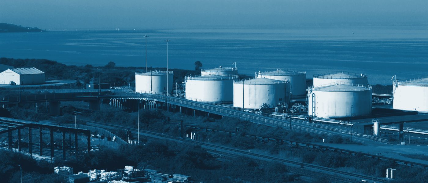 Large fuel storage tanks at a coastal depot